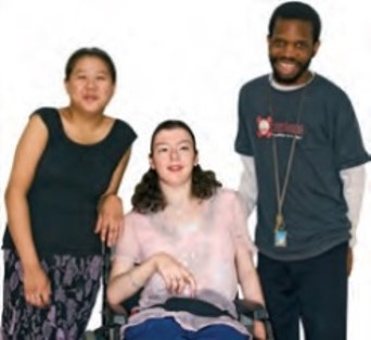 Three people having a photo taken together