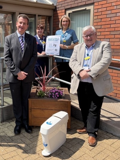 Dr Ian Turner, Clair Farley, SPH Clinical Lead, Beth Weston, Clinical Specialist Nurse and Neil Carr CEO with a sanitary bin and campaign poster.jpg