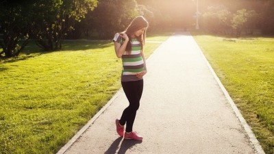 Pregnant woman holding baby bump