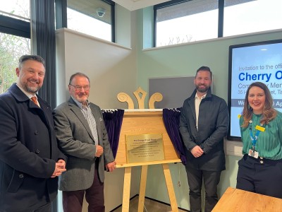 A plaque being unveiled at Cherry Orchard.