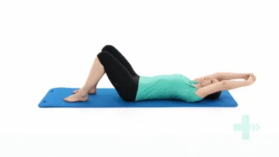 Moving image of someone lying on their back raising their arms above their head.